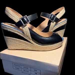Theme Woman’s Wedge Sandals. New In Box Size 10